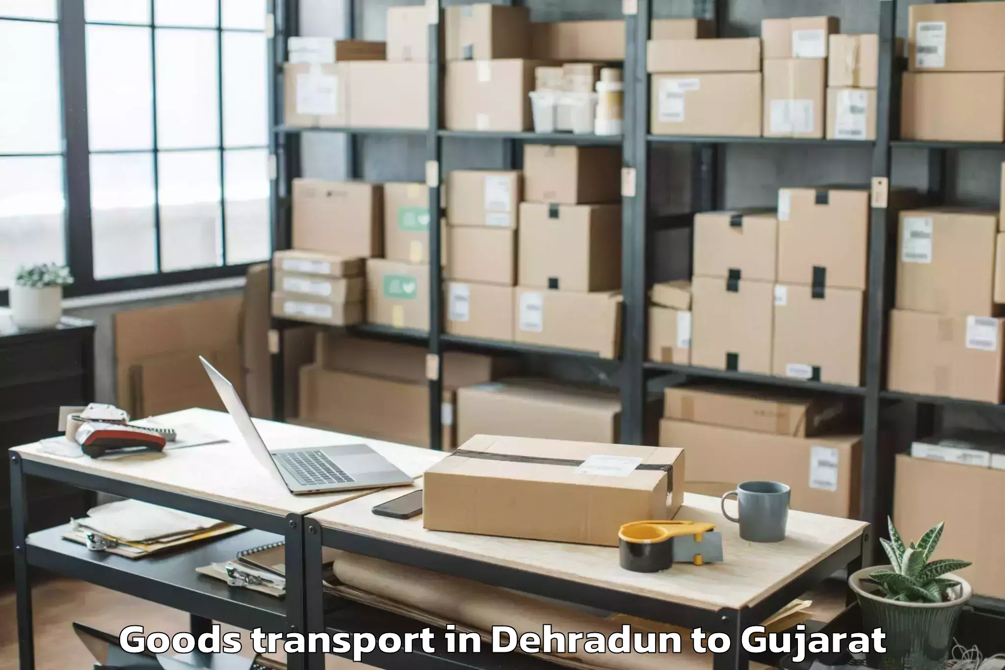 Trusted Dehradun to Kalavad Goods Transport